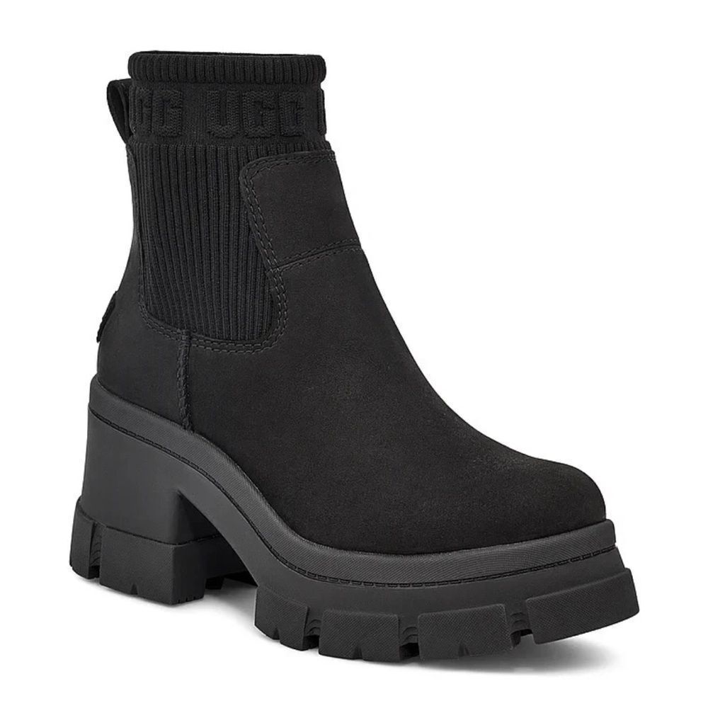 Ugg Brooklyn Chelsea Boots Black Suede heel label with embossed UGG® logo.